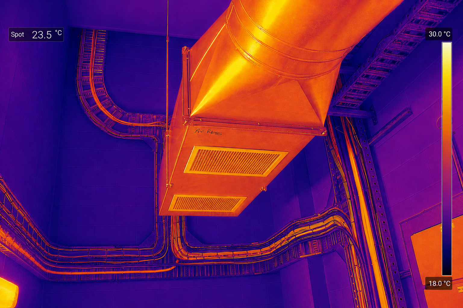 Thermal imaging scan of industrial HVAC ducting and electrical conduits showing heat distribution